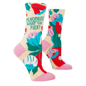 Blue Q W-Crew socks with the phrase "Menopause. What The Fuck?"—a humorous design to lighten the journey through menopause.