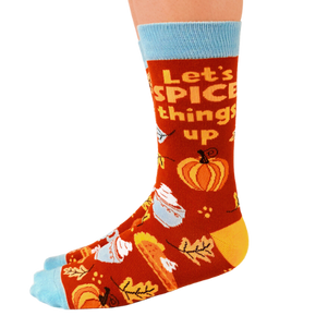 Print on Socks: "Let's Spice Things Up" Orange background with all things fall on them.